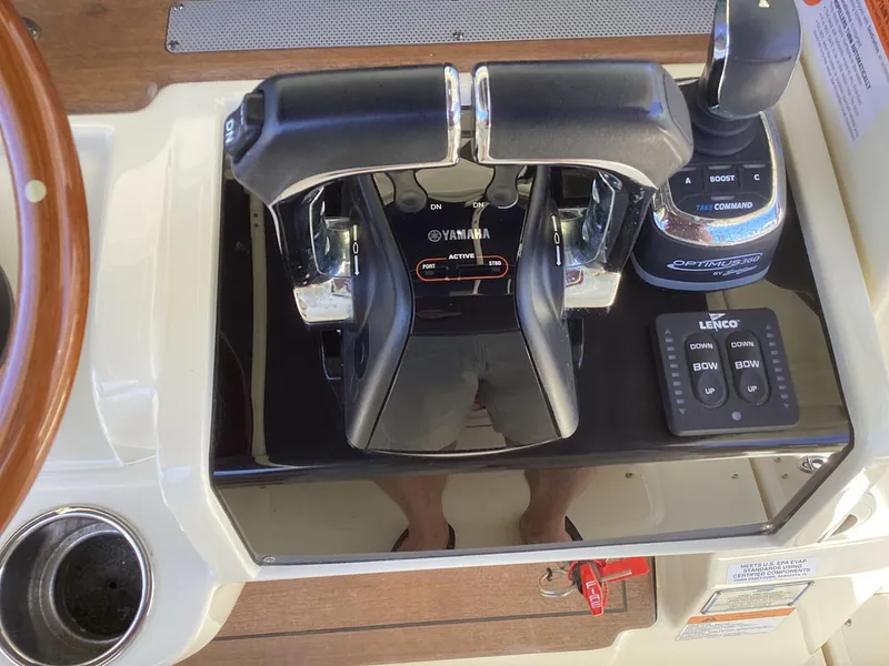 Slide: The Image of Control panel of a 2016 Chris-Craft 34 Catalina boat with Yamaha throttle. - 21