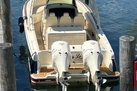Slide: The Image of 2016 Chris-Craft 34 Catalina boat docked with twin outboard engines. - 3