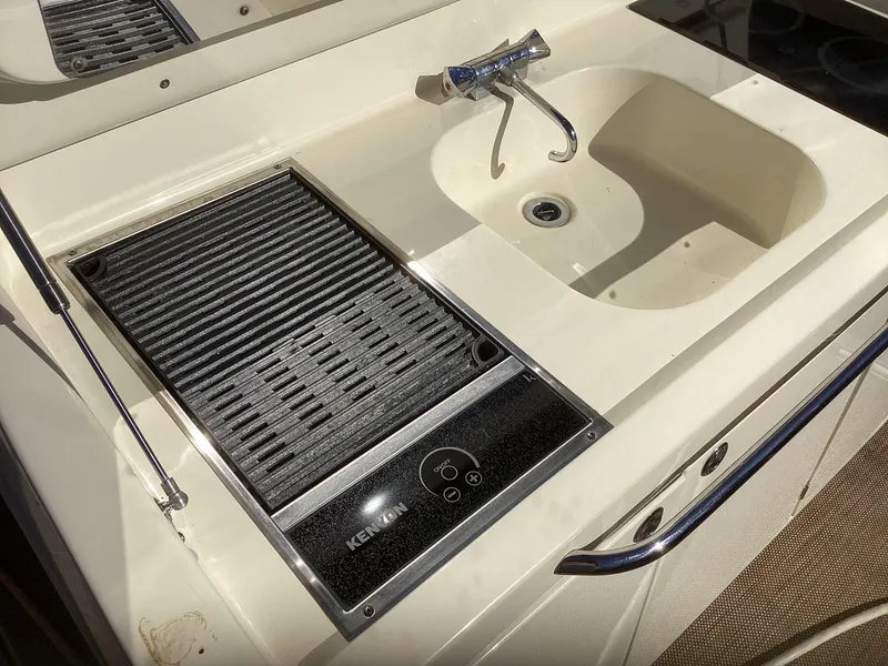 Slide: The Image of 2016 Chris-Craft 34 Catalina boat sink and grill area. - 46