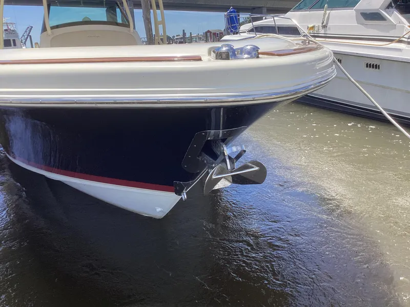 Slide: The Image of Chris-Craft 34 Catalina 2016 boat docked, front view with anchor. - 8