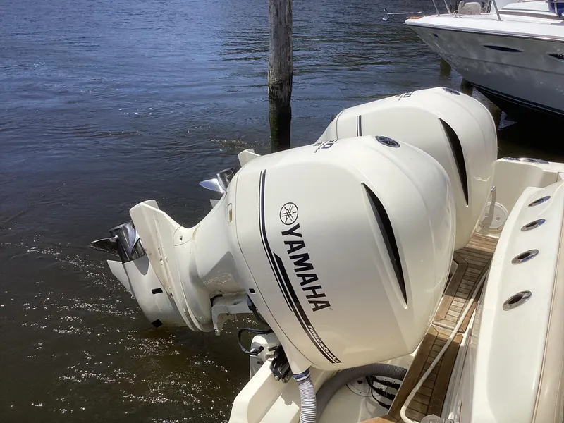 Slide: The Image of 2016 Chris-Craft 34 Catalina with triple Yamaha outboard engines. - 9