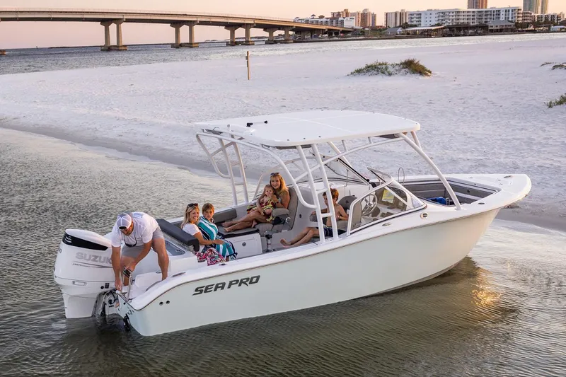 Slide: The Image of 2024 Sea Pro 240 Dual Console boat interior with seating and helm. - 1