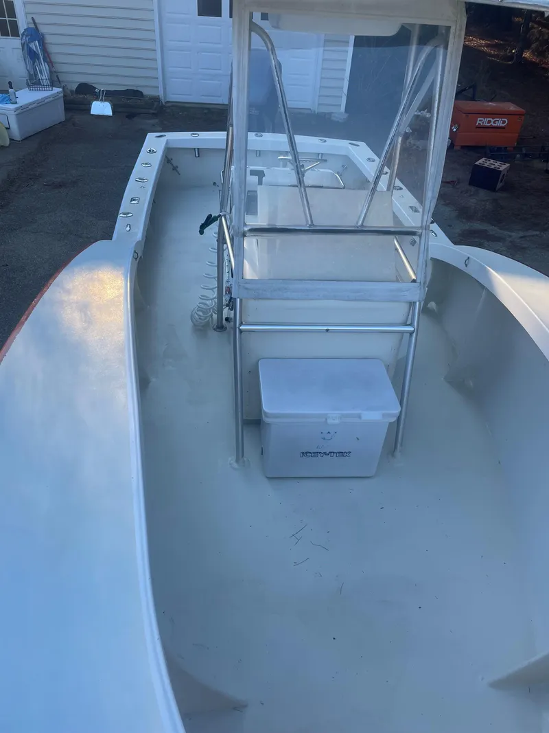 Slide: The Image of Custom Carolina Bandy 26' boat interior, 2000 model, with center console and storage box. - 17