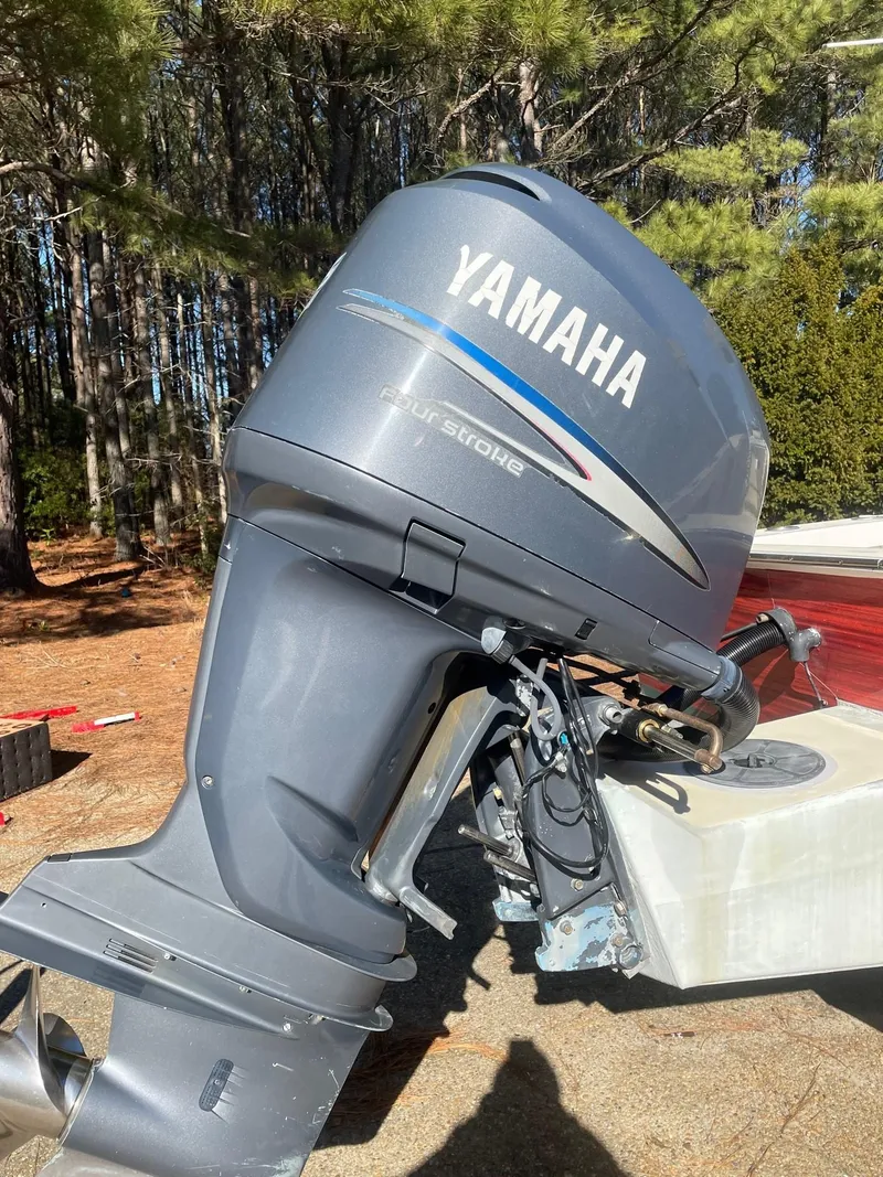 Slide: The Image of Yamaha four-stroke outboard motor on 2000 Custom Carolina Bandy 26' boat. - 22