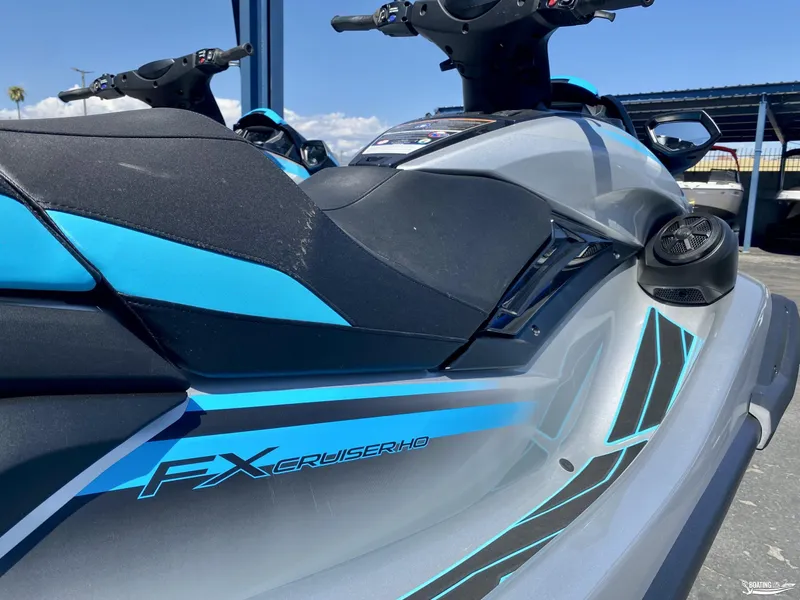Slide: The Image of 2024 Yamaha WaveRunner FX Cruiser HO with Audio, sleek design, blue accents. - 2
