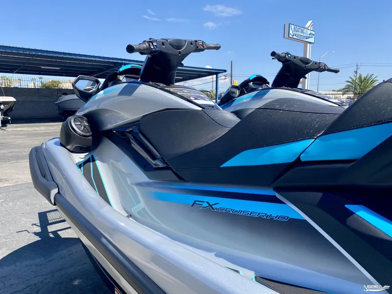 Slide: The Image of 2024 Yamaha WaveRunner FX Cruiser HO with Audio, sleek design, parked outdoors. - 3