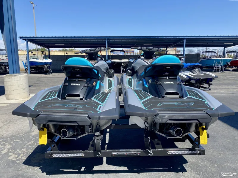Slide: The Image of 2024 Yamaha WaveRunner FX Cruiser HO with Audio, rear view, parked outdoors. - 5