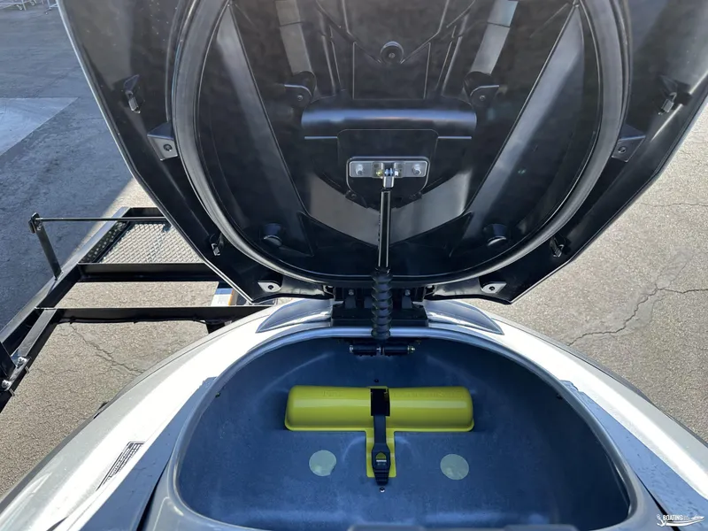 Slide: The Image of 2024 Yamaha WaveRunner FX Cruiser HO storage compartment open, showing interior details. - 6