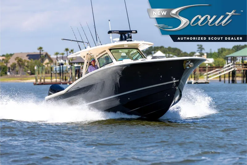 The Image of 2025 Scout 400 LXF boat cruising on water, showcasing sleek design and performance. - 0