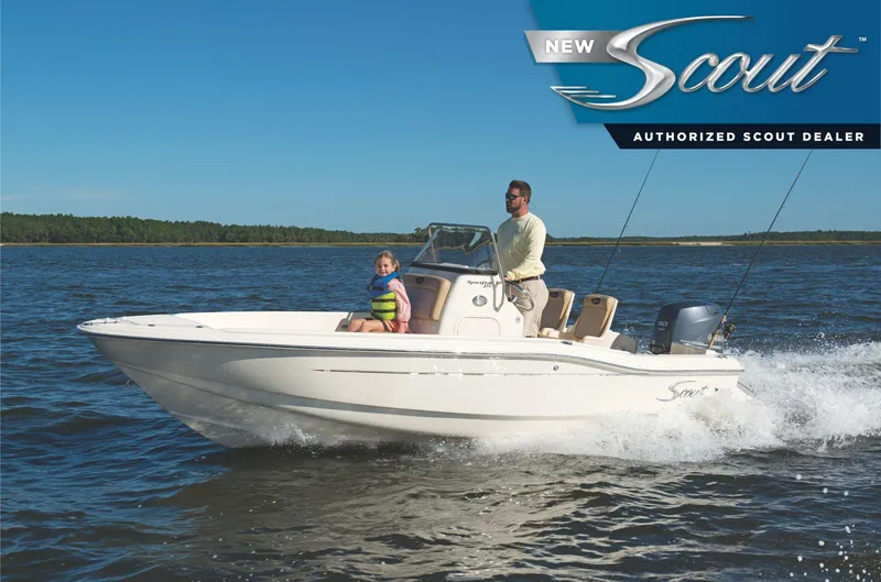 The Image of 2025 Scout 175 Sportfish boat cruising on a sunny day with two passengers. - 0