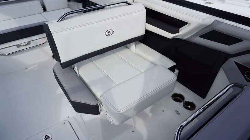 Slide: The Image of 2024 Cobalt R4 boat interior with white and gray seating. - 14