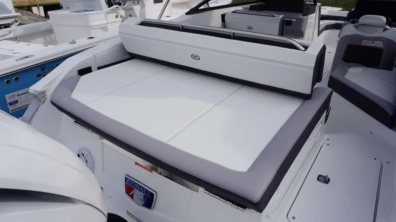 Slide: The Image of 2024 Cobalt R4 boat interior with white and gray seating. - 8