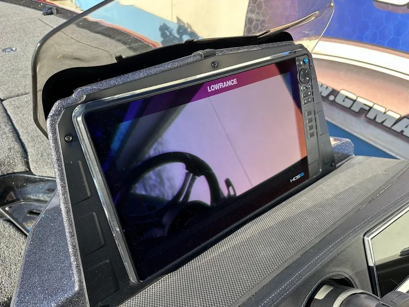 Slide: The Image of 2024 Ranger Z521R boat with Lowrance display screen, close-up view. - 13