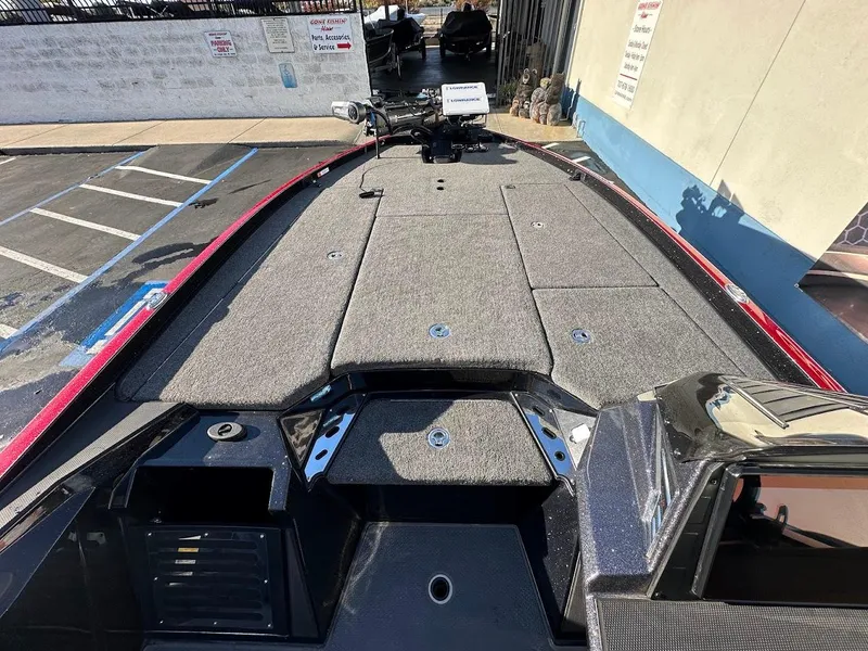 Slide: The Image of 2024 Ranger Z521R Ranger Cup Equipped boat deck, featuring spacious storage and sleek design. - 16