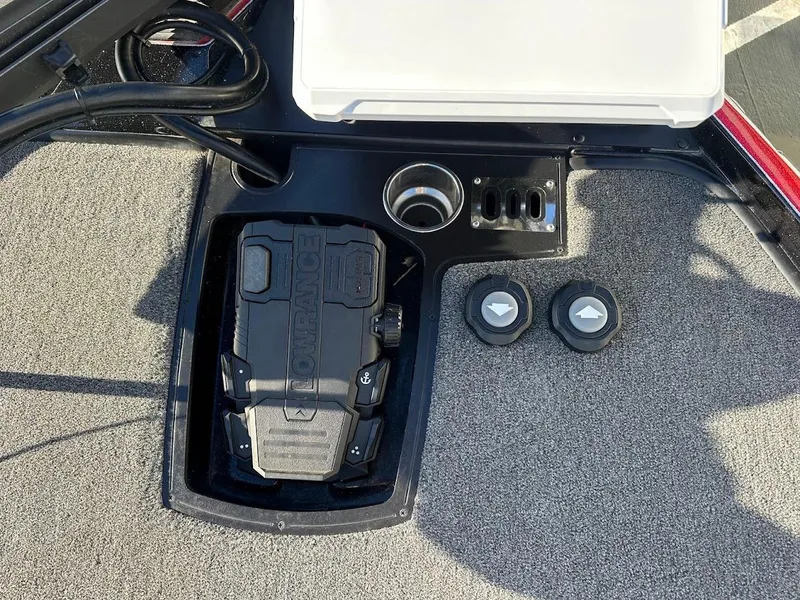 Slide: The Image of 2024 Ranger Z521R Ranger Cup Equipped boat dashboard with controls and storage. - 19