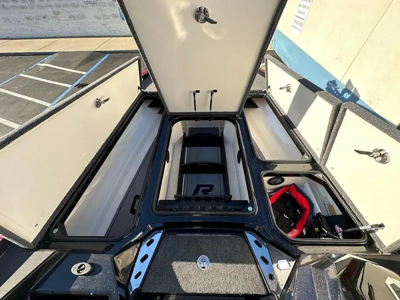 Slide: The Image of 2024 Ranger Z521R Ranger Cup Equipped boat storage compartments open. - 21