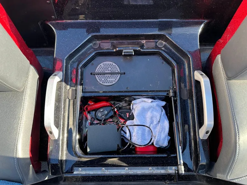 Slide: The Image of 2024 Ranger Z521R storage compartment with equipment and accessories. - 27