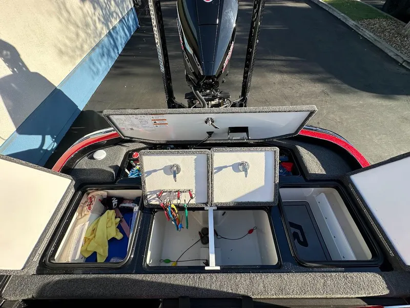 Slide: The Image of 2024 Ranger Z521R Ranger Cup Equipped boat storage compartments open. - 28