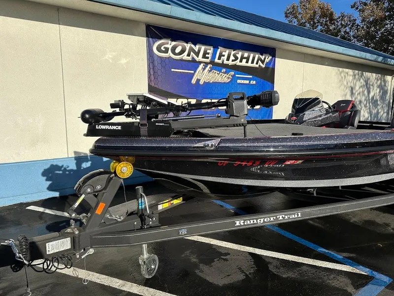 Slide: The Image of 2024 Ranger Z521R fishing boat on trailer, parked outside dealership. - 3