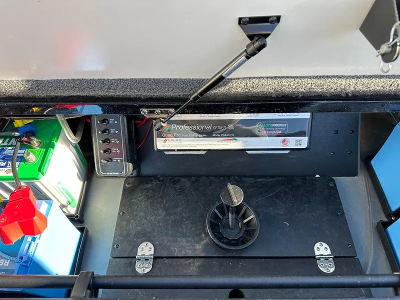 Slide: The Image of 2024 Ranger Z521R Ranger Cup Equipped storage compartment with battery and wiring. - 33