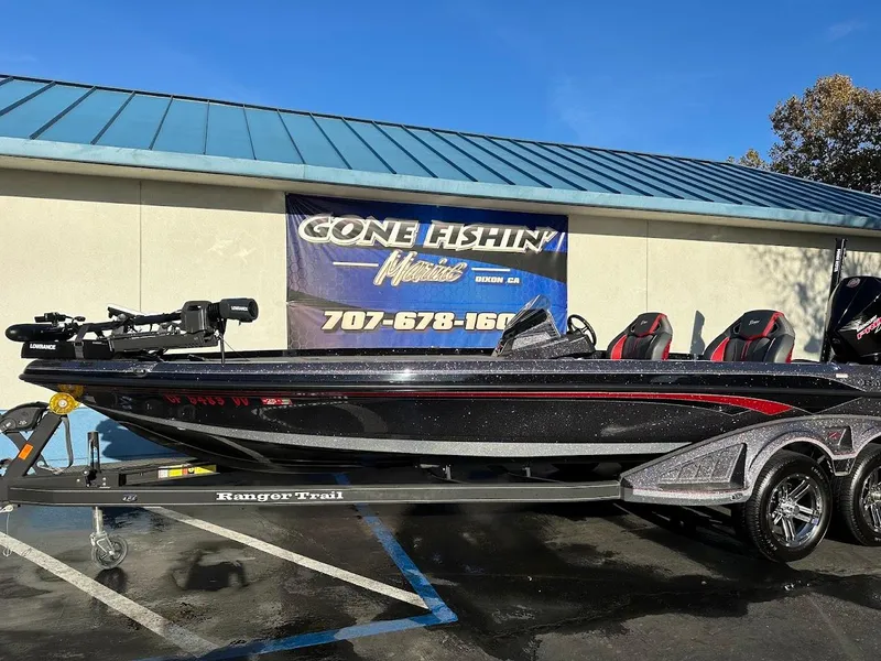 Slide: The Image of 2024 Ranger Z521R Ranger Cup Equipped boat on trailer, parked outside dealership. - 4