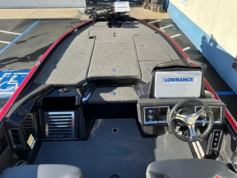 Slide: The Image of 2024 Ranger Z521R boat interior with Lowrance electronics and steering wheel. - 8
