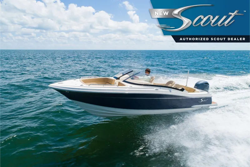 The Image of 2025 Scout 215 Dorado boat cruising on open water under a clear sky. - 0