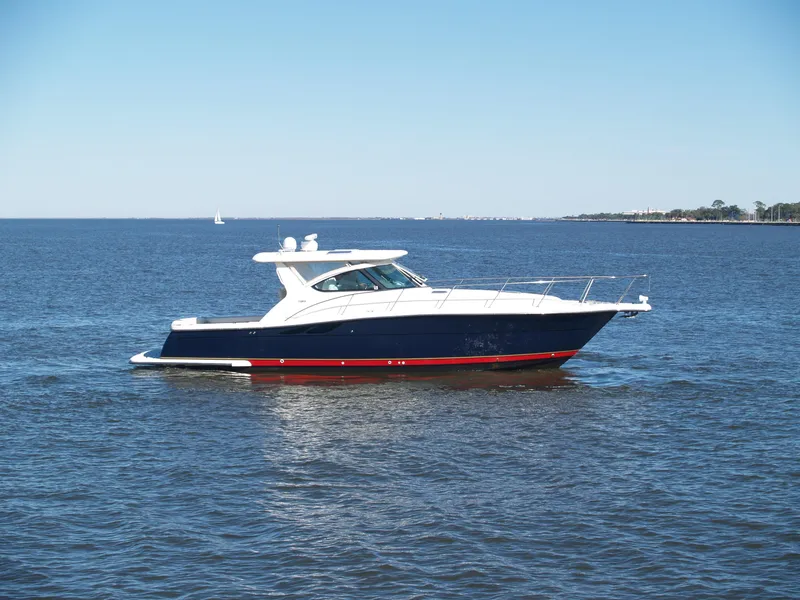 The Image of 2004 Tiara Yachts 3800 Open cruising on calm waters. - 0