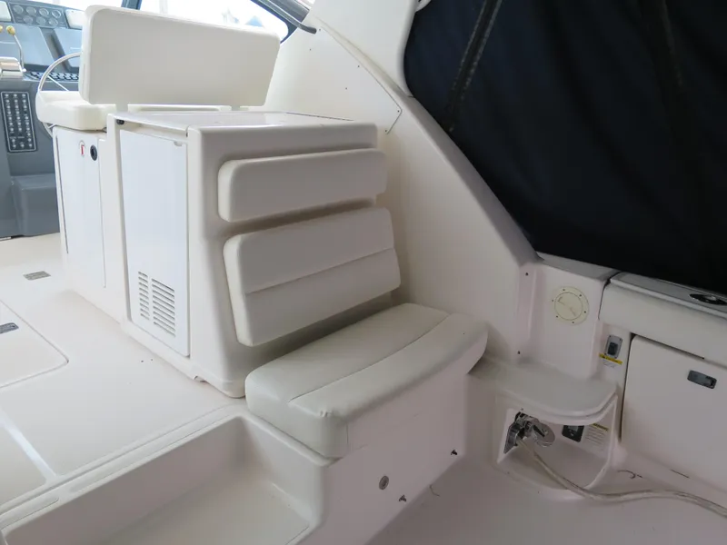 Slide: The Image of 2004 Tiara Yachts 3800 Open interior seating and helm station. - 4