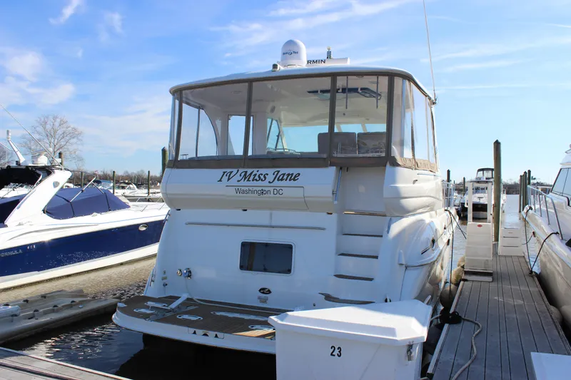 Slide: The Image of 2002 Sea Ray 480 Motor Yacht docked at marina. - 0