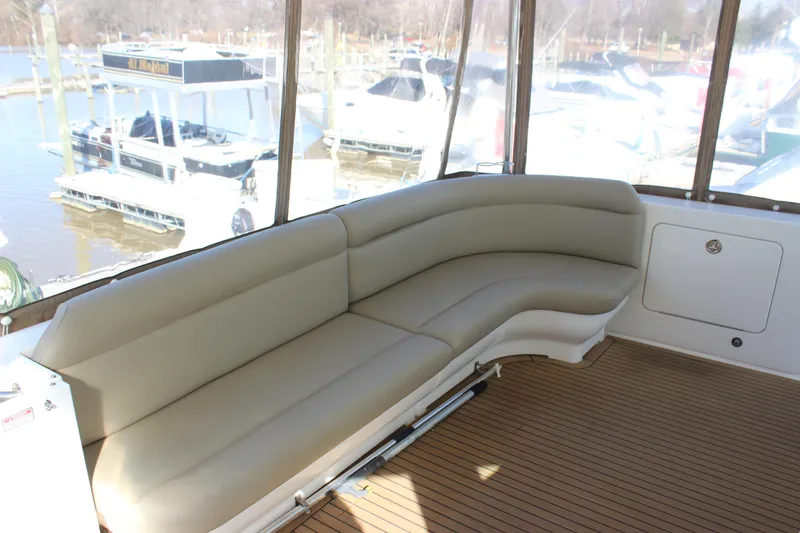 Slide: The Image of 2002 Sea Ray 480 Motor Yacht with spacious outdoor seating area. - 11