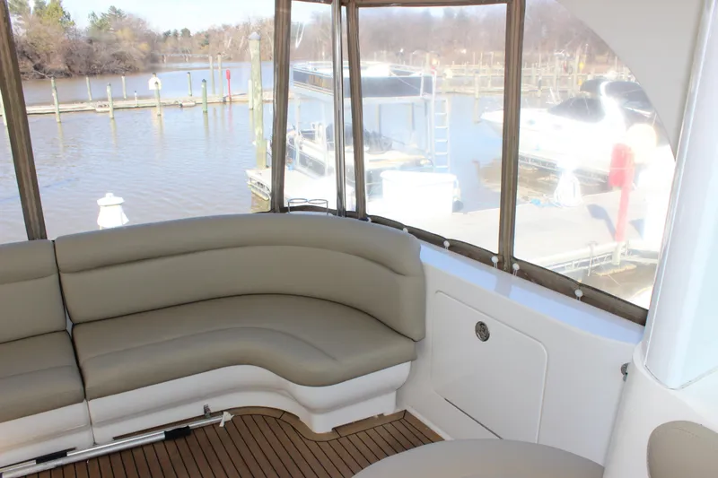 Slide: The Image of 2002 Sea Ray 480 Motor Yacht interior with dock view. - 18