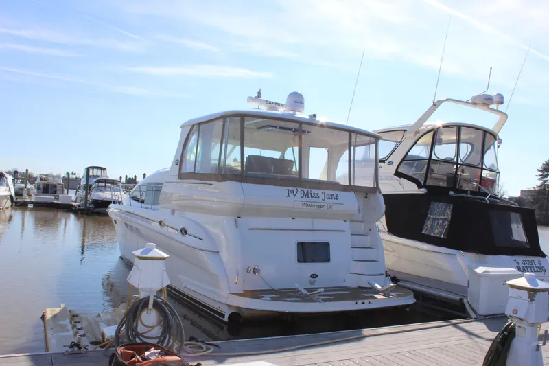 Slide: The Image of 2002 Sea Ray 480 Motor Yacht docked at a marina. - 3