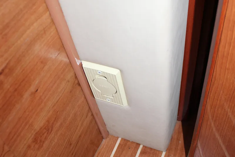 Slide: The Image of Electrical outlet on 2002 Sea Ray 480 Motor Yacht interior wall. - 40