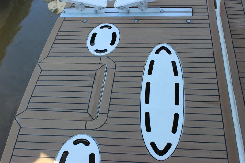 Slide: The Image of Teak deck of a 2002 Sea Ray 480 Motor Yacht with white inlays. - 7