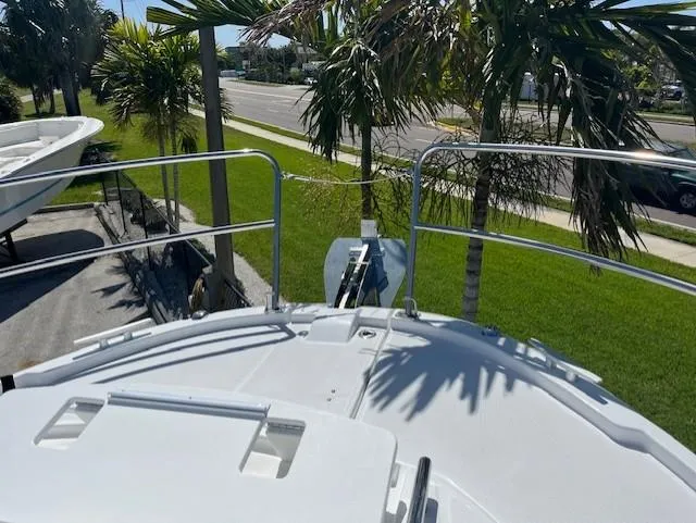 Slide: The Image of 2024 Jeanneau NC Weekender 895 bow with anchor and railings. - 8