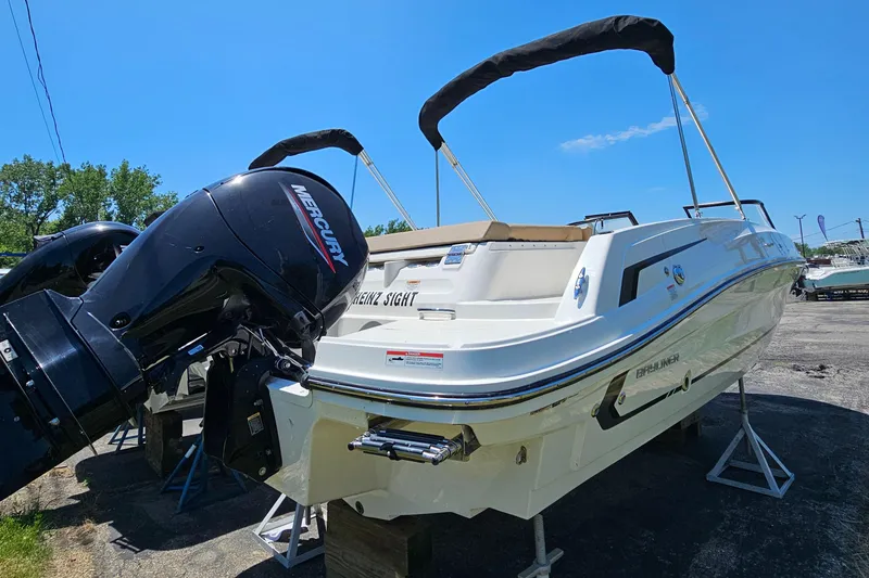 Slide: The Image of 2022 Bayliner VR 6 boat with Mercury outboard motor on display. - 4