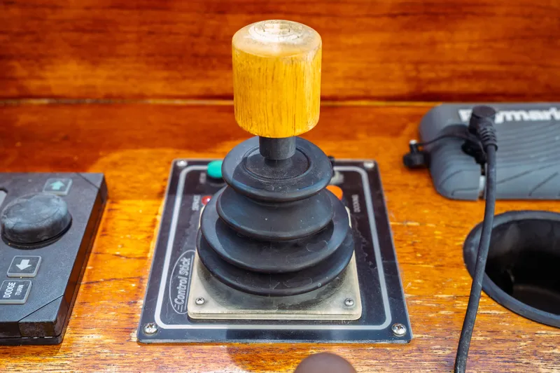 Slide: The Image of Control stick on a 2000 Hinckley Picnic Boat Classic dashboard. - 36