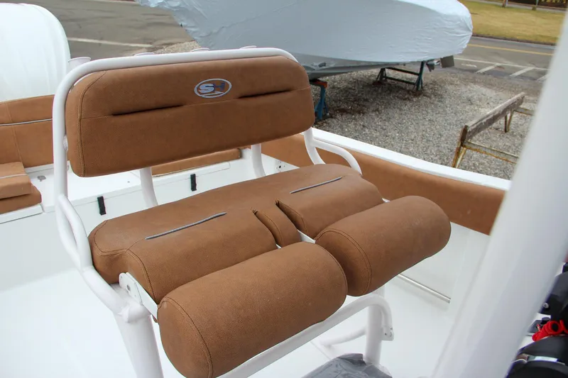 Slide: The Image of 2024 Sea Hunt Ultra 234 boat seating with brown cushions - 22