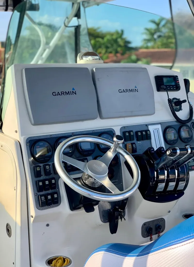 Slide: The Image of 2005 Hydra-Sports Vector 3300 VX boat dashboard with Garmin navigation system. - 4