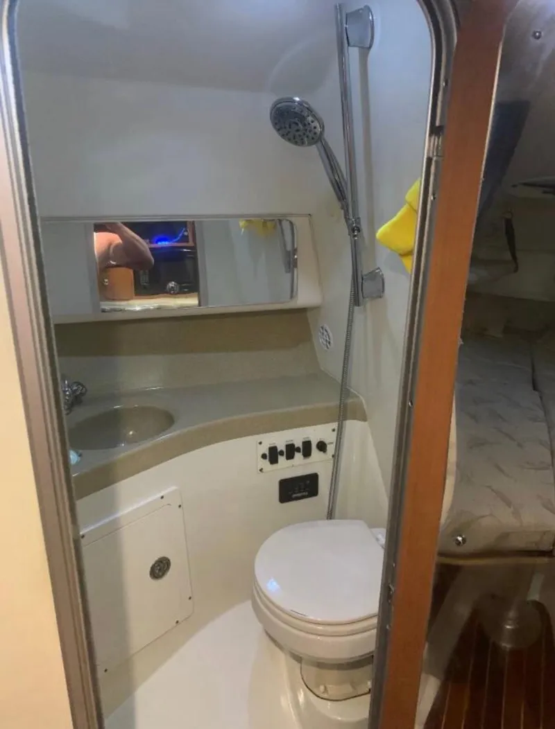 Slide: The Image of 2005 Hydra-Sports Vector 3300 VX boat bathroom with shower and toilet. - 7