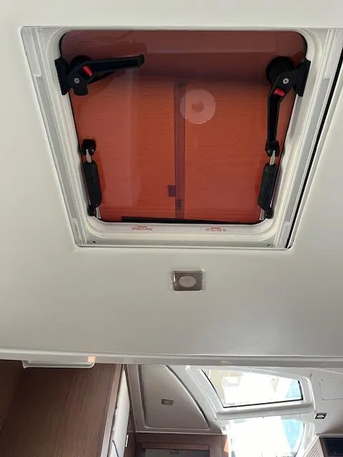 Slide: The Image of Ceiling hatch of 2024 Jeanneau Leader 12.5 WA boat interior. - 15