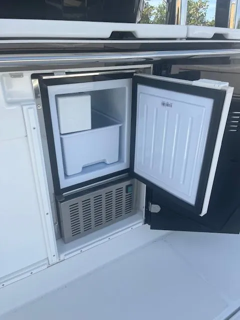 Slide: The Image of Open refrigerator on 2024 Jeanneau Leader 12.5 WA boat. - 24