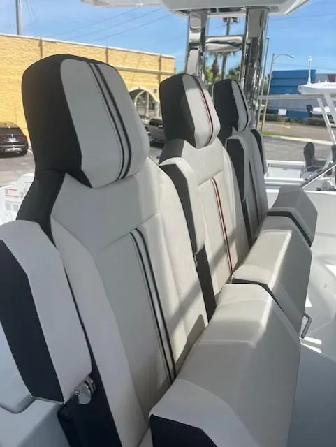 Slide: The Image of 2024 Jeanneau Leader 12.5 WA boat seating with modern design and comfortable upholstery. - 25