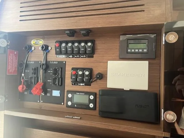 Slide: The Image of Control panel of 2024 Jeanneau Leader 12.5 WA boat with Seakeeper and Fusion systems. - 8