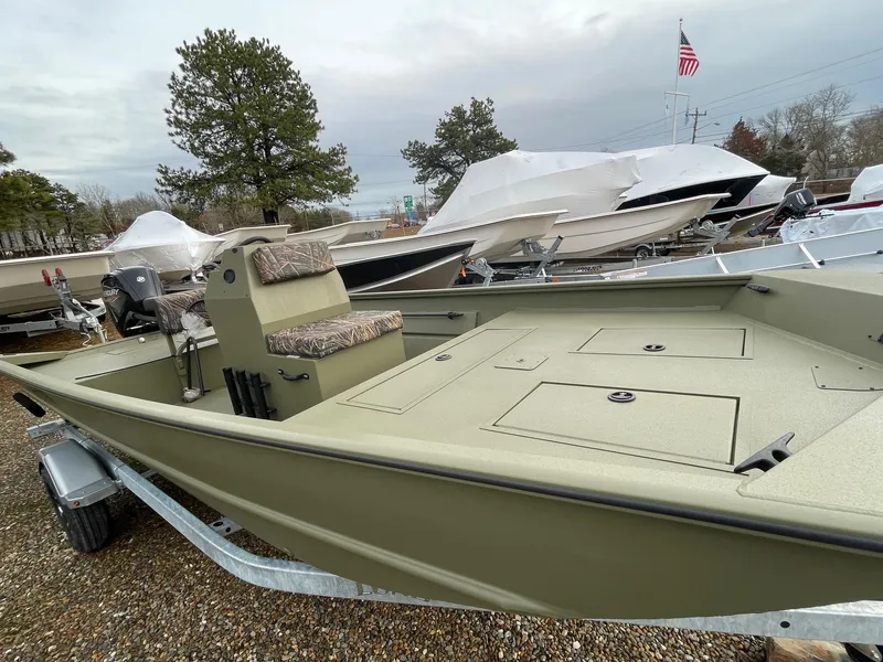 Slide: The Image of 2024 Lund 1870 Predator boat on trailer, ready for outdoor adventures. - 1