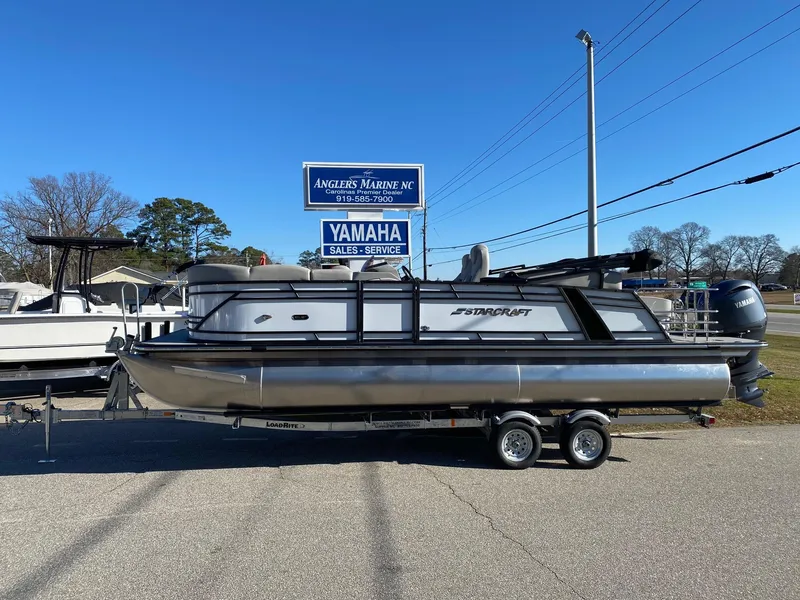 The Image of 2024 Starcraft SLS3 pontoon boat on trailer at Angler's Marine NC. - 0