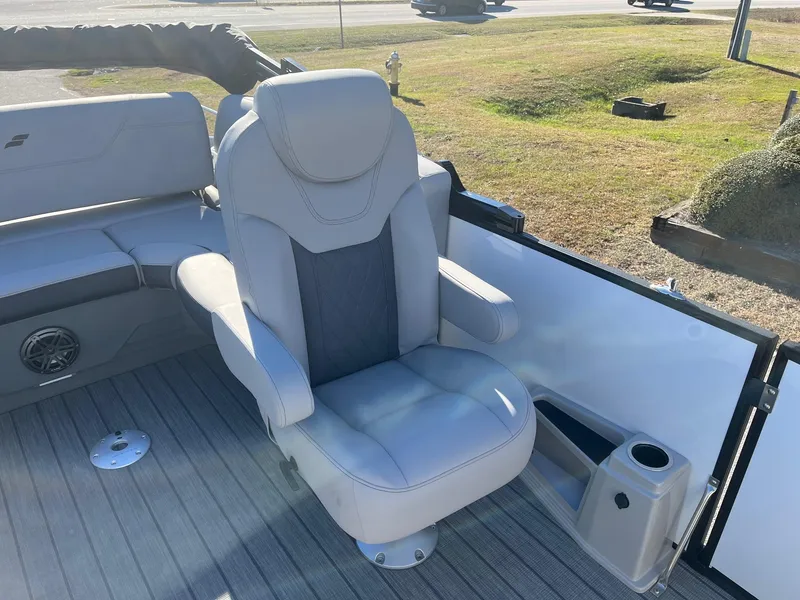 Slide: The Image of 2024 Starcraft SLS3 boat with a luxurious captain's chair on deck. - 9