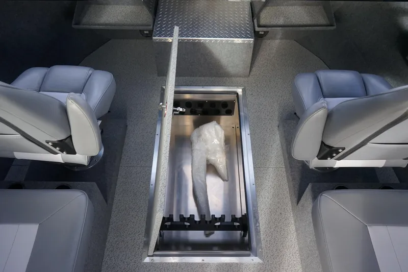 Slide: The Image of 2024 Thunder Jet 24 Alexis Pro HT interior storage compartment with seating. - 13