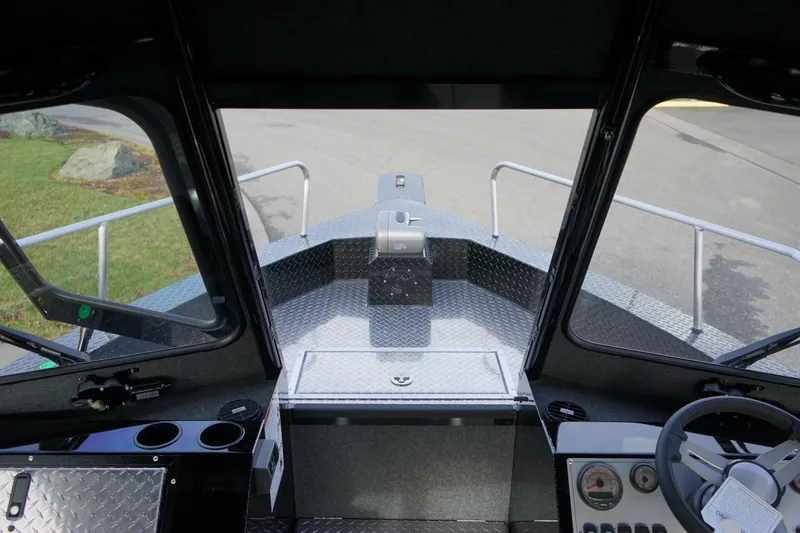 Slide: The Image of 2024 Thunder Jet 24 Alexis Pro HT boat interior, view from the helm. - 16